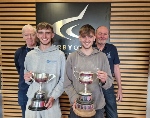 Twin brothers George and Jonny McFarlane have scored a first in a national bricklaying competition. 